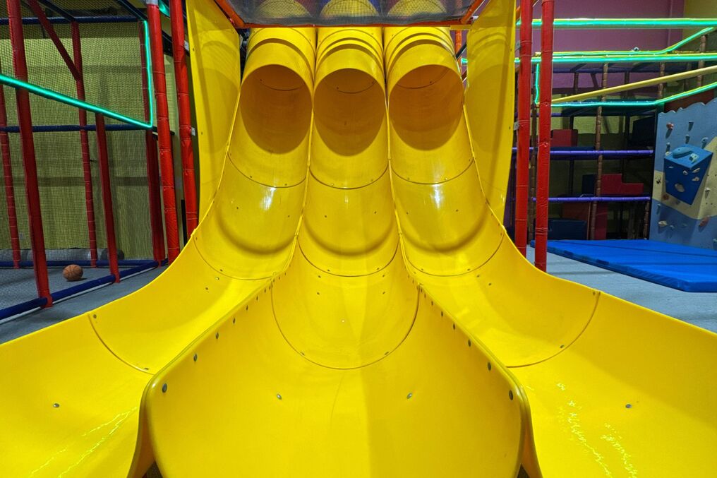 Triple-Lane Giant Yellow Slides at Playtopia