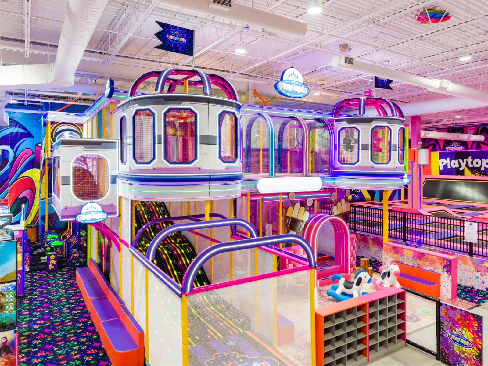 3-storey indoor playground with climbing zones and slides.