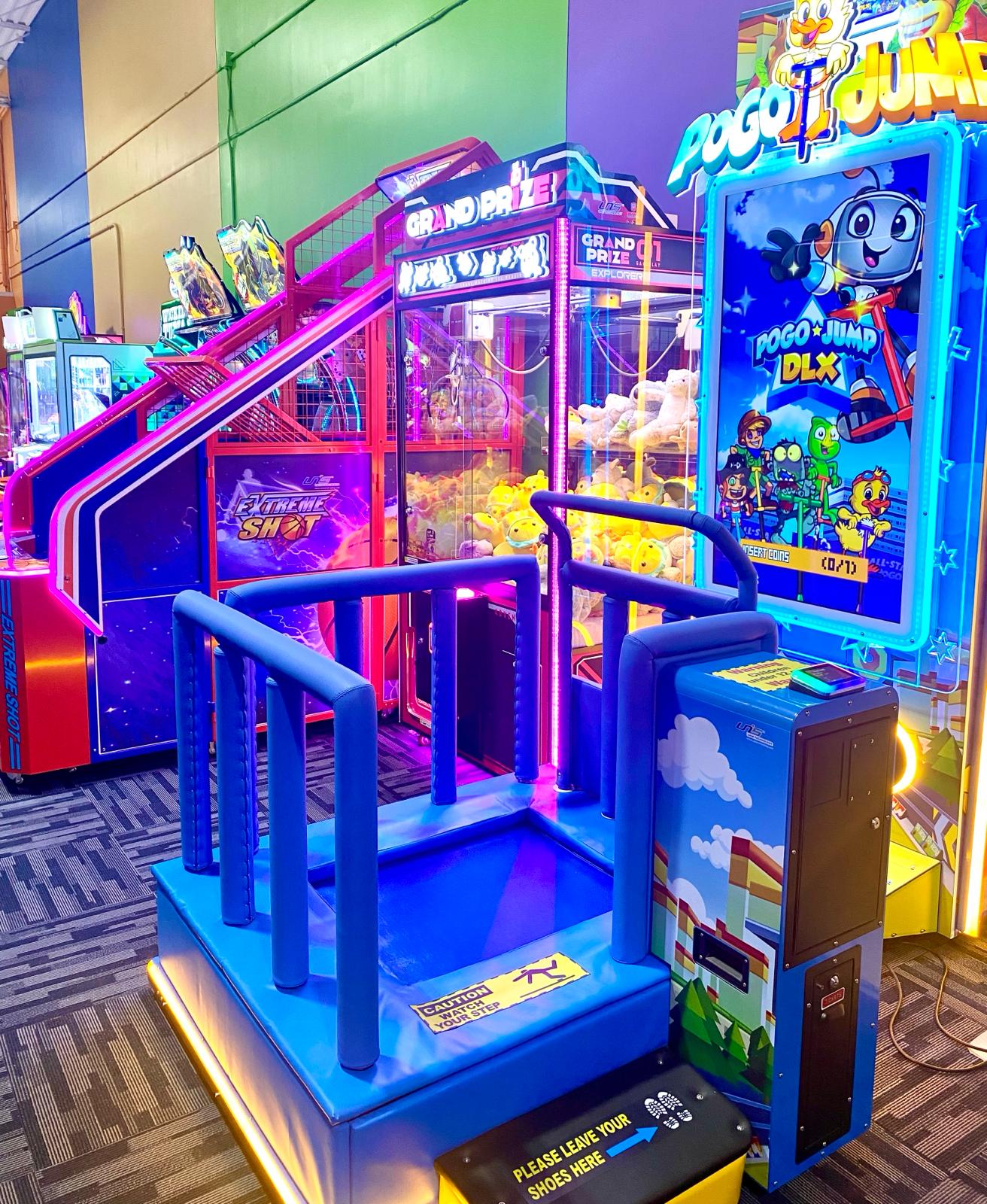Glowing arcade machines and gaming consoles for kids.